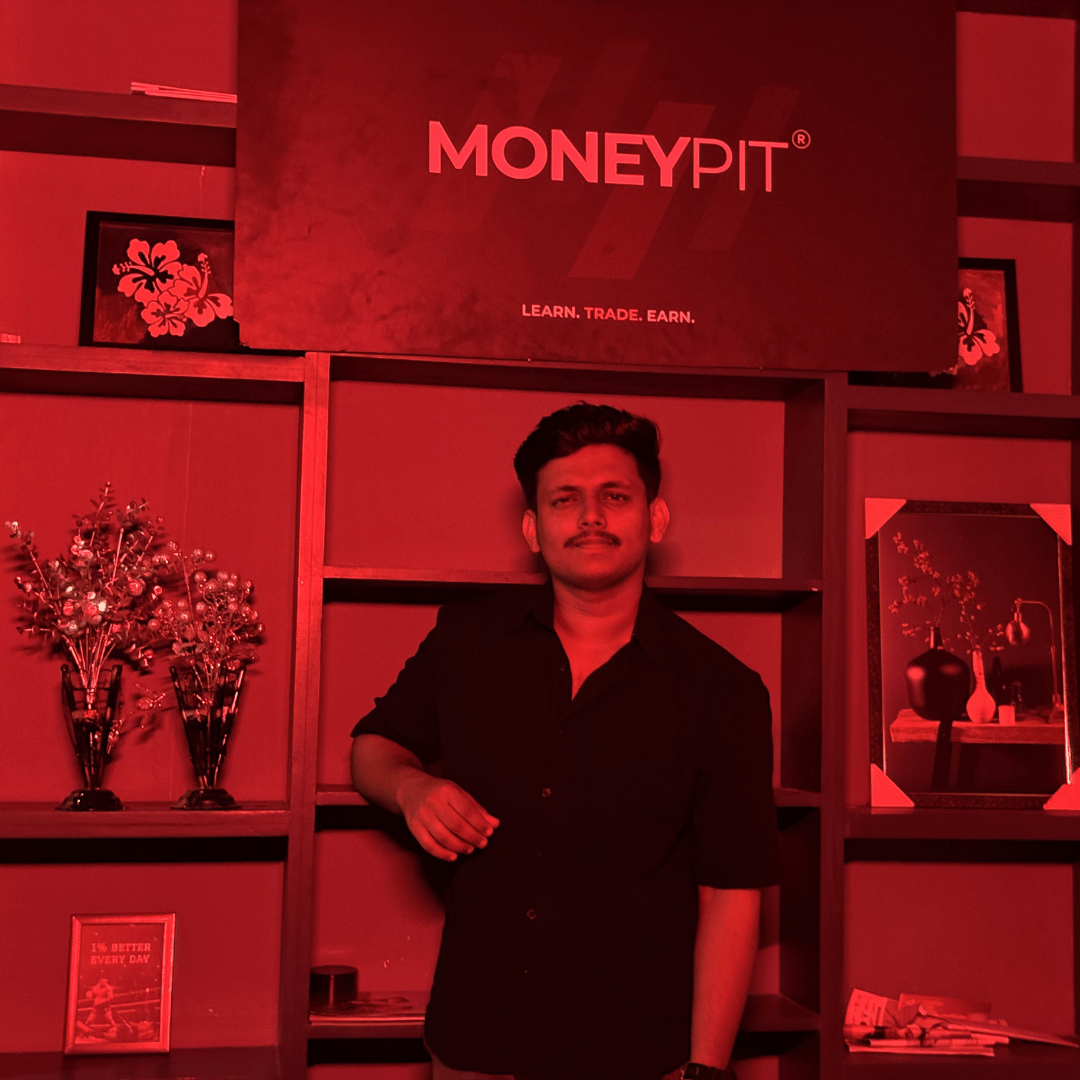 Ahammed Shamhoon standing inside Moneypit Trading Academy Office.