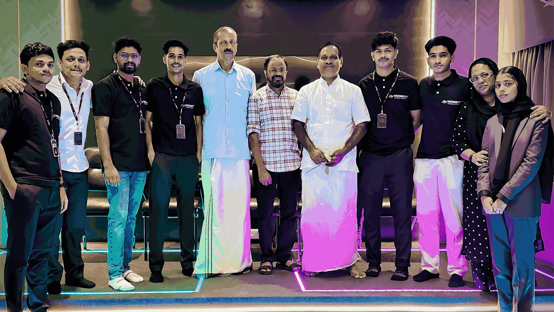 Group photo at the inauguration of Moneypit Trading Academy featuring the founders, the Mayor of Kannur, the Vyapari Vyavasayi president of Kannur, and attendees.